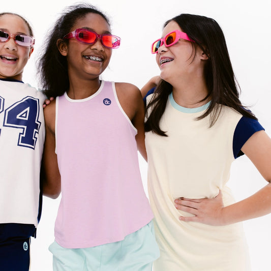 tween girls wearing the decided collection pajamas and loungewear